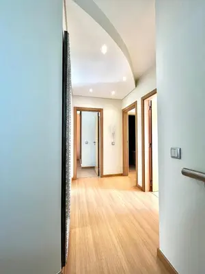 a hallway with an archway in a house at Funtastic Villa With Pool in Albufeira