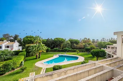 an aerial view of a yard with a swimming pool at BeGuest Copacabana Vilamoura Apartment in Quarteira
