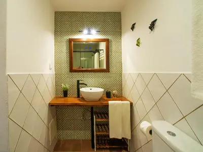 a bathroom with a sink and a mirror at Holiday Home Sebastião by Interhome in Paderne