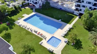 an overhead view of a large swimming pool in a yard at Vilamoura Central 4 With Pool by Homing in Vilamoura