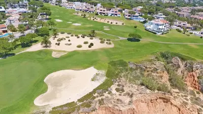 an aerial view of the golf course at the cliffs at Villa Seaside in Vale do Lobo