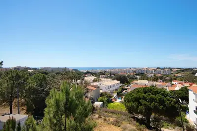 a view of the city from the hill at Apartamento T1 - Em zona tranquila in Olhos de Água