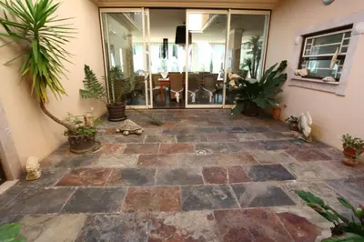 a patio with potted plants in a house at Amazing Portuguese Villa Villa Heroine 6 Bedrooms Stunning Position in Albufeira