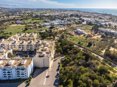 an aerial view of a city with buildings at Salgados 1 Bedroom Apartment - 500m from the Beach in Guia