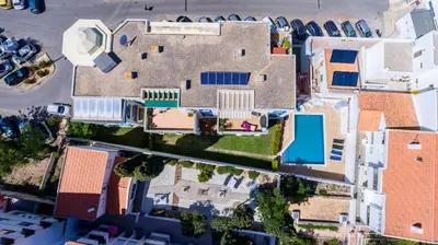 an overhead view of a house with a pool at Apartment Claro Azul in Albufeira