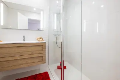 a bathroom with a shower and a sink at Apartment Brisbane by Algarve Vacation in Albufeira
