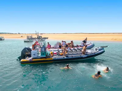 a group of people on a boat in the water at Apartment Montego Bay by Algarve Vacation in Albufeira