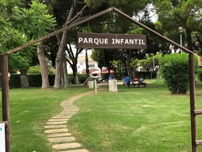 a park with a sign that reads papere infinity at Estúdio na Falésia in Albufeira