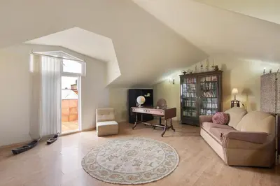 a living room with a couch and a table at Casa da Cidade de Loulé in Loulé