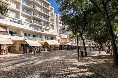 an empty street in a city with a building at Albufeira Old Town Center - VERASOL 2 in Albufeira