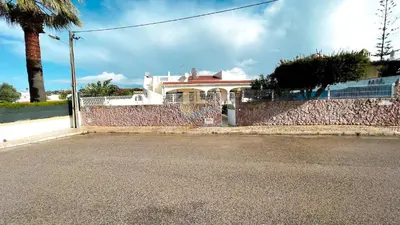 a house on the side of a street at Villa Gilsónia by Sunny Deluxe in Guia