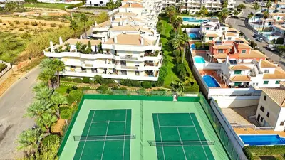 an overhead view of a tennis court and buildings at Sao Rafael Beach Luxury Home by Be Cherish in Albufeira