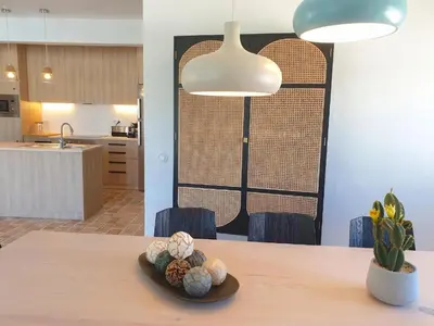 a dining room table with a plate of food on it at Superb Vilamoura Villa 5 Bedrooms Villa Azul Walking Distance To Marina in Quarteira
