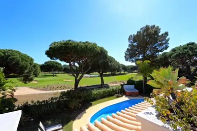 a resort with a pool and a golf course at Luxury Vilamoura Villa 4 Bedrooms Villa Corvo Billiards in Quarteira