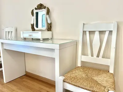 a white desk with a chair and a machine on it at Olivos del golf - Terrace with pool by HD in Vilamoura