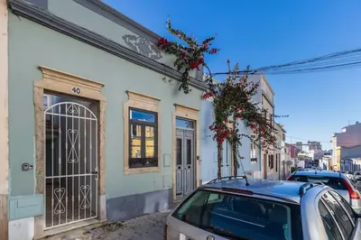 a car parked in front of a building at RG Casa do Carmo in Faro