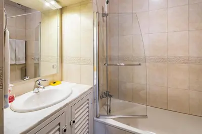 a bathroom with a sink and a shower at Private 2 Bed Apartment in Albufeira Old Town in Albufeira