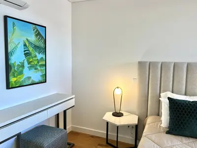 a living room with a couch and a fireplace at One - Luxurious apartment by HD PROPERTIES in Vilamoura