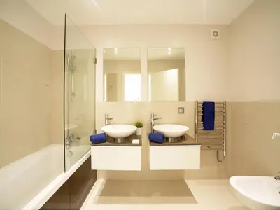 a swimming pool with lounge chairs and a resort at Apartment Pine Hills Rubi by Interhome in Vilamoura