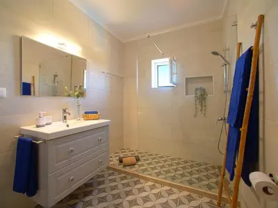 a bathroom with a sink and a shower at Villa Mariana by Interhome in Galé