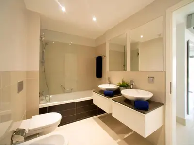 a bathroom with a sink and a shower at Apartment Pine Hills Pérola by Interhome in Vilamoura