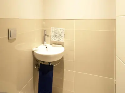 a bathroom with a shower and a toilet and a sink at Apartment Pine Hills Pérola by Interhome in Vilamoura