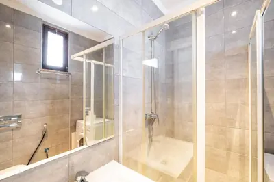 a bathroom with a shower and a sink at #099 T1 Caliços by Home Holidays in Albufeira
