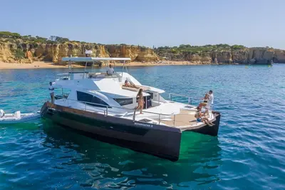 a group of people on a boat in the water at 8-Bed Villa in Vilamoura-Sleeps-Playground-Pool in Vilamoura