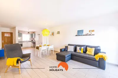 an apartment with a swimming pool in front of a building at #112 Oura Flat by Home Holidays in Albufeira