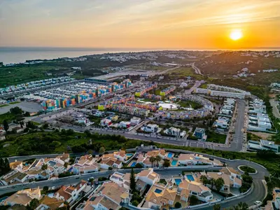 an aerial view of a city with a harbor at Villa Loria - beautiful panoramic views in Albufeira