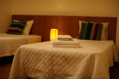 two towels on top of a bed in a room at Villa Arade - Complex ideal for families in Albufeira