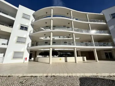 a large white building with balconies on it at Albufeira Forest View With Pool by Homing in Albufeira