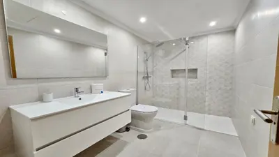 a bathroom with a sink and a shower and a toilet at Los Olivos Del Golf 249- CleverDetails, Sleeps 6 Adults 1 Child in Vilamoura