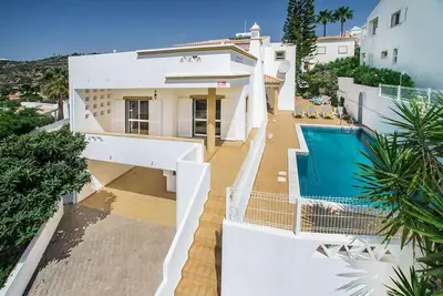 an aerial view of a house with a swimming pool at Villa Almanda - Spacious villa perfectly located between Albufeira Marina and the Old Town in Albufeira