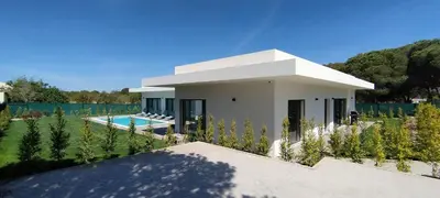 a white house with a pool in front of it at Valverde 3 Villa, Vilamoura, Algarve, only 5 minutes from Marina, Golf and Beach in Quarteira