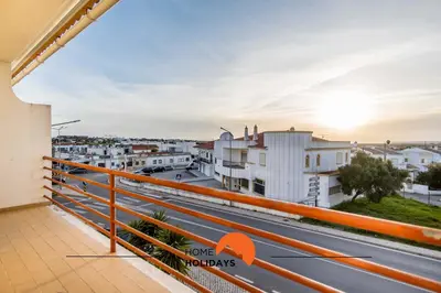 a balcony with a view of a city at #123 T2 Pão das Areias by Home Holidays in Albufeira