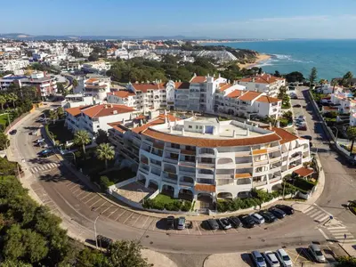 an aerial view of a building in a city at Lemon House - 400m from the Beach - Wifi in Albufeira