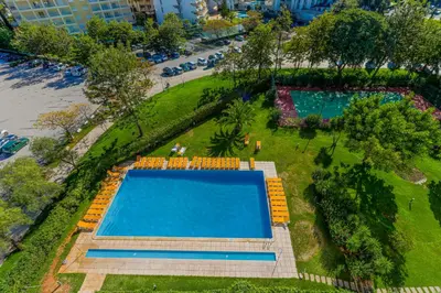 an overhead view of two swimming pools in a park at Apartamento Valerie in Vilamoura