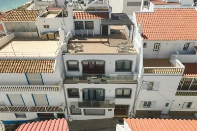 an overhead view of white buildings with red roofs at Miral Beachside 3 - by HD Properties in Albufeira