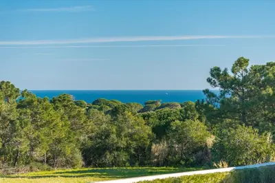 a view of the ocean from the road at Villa Castelo Beach - Cosy modern - 500m from Castelo beach in Albufeira