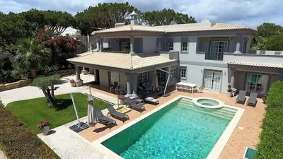 an aerial view of a house with a swimming pool at Villa Selena - Beautiful Luxury villa with massage baths in Quinta do Lago