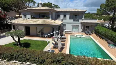 an aerial view of a house with a swimming pool at Villa Selena - Beautiful Luxury villa with massage baths in Quinta do Lago