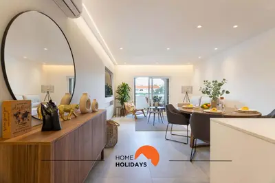 a kitchen and dining room with an archway in a house at #126 T1 Vale Mangude 213 by Home Holidays in Albufeira