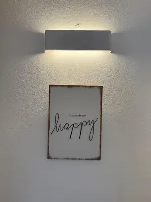 a logo for a cozy apartment building at COZY APARTMENT OURA BEACH in Albufeira