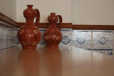 two vases sitting on top of a table at Albufeira Beach - Tranquilidade junto à praia e ao centro! in Albufeira