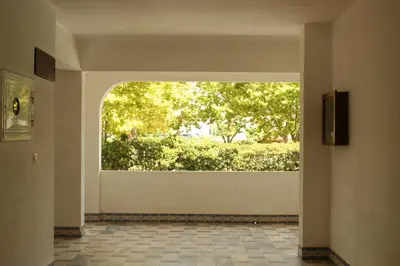 a hallway with a large window in a building at Albufeira Beach - Tranquilidade junto à praia e ao centro! in Albufeira