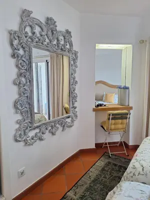 a mirror on a wall in a room at Piece of Paradise @ Balaia Golf Village, Albufeira, PORTUGAL - 4 STAR in Albufeira