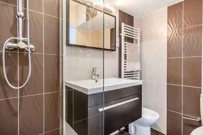 a bathroom with a sink and a toilet at Villa Patio in Albufeira