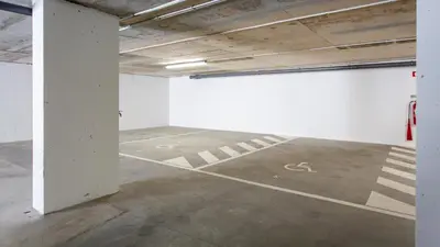 an empty parking lot in an empty parking garage at Dream Apartment W/Pool & Balcony by LovelyStay in Albufeira