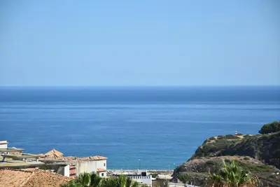 a view of the ocean from a hill at Villa Malu in Albufeira